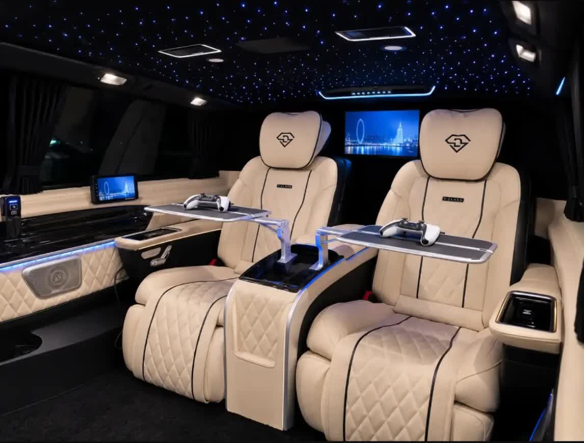 Cream leather VIP reclining seats inside the Layana V-Class